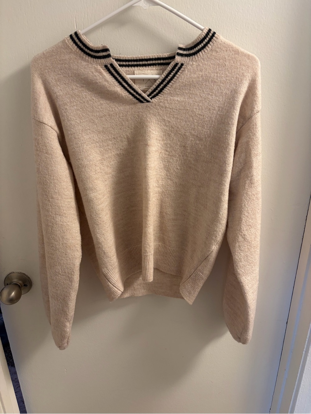Cream V-Neck Sweater with Black Trim